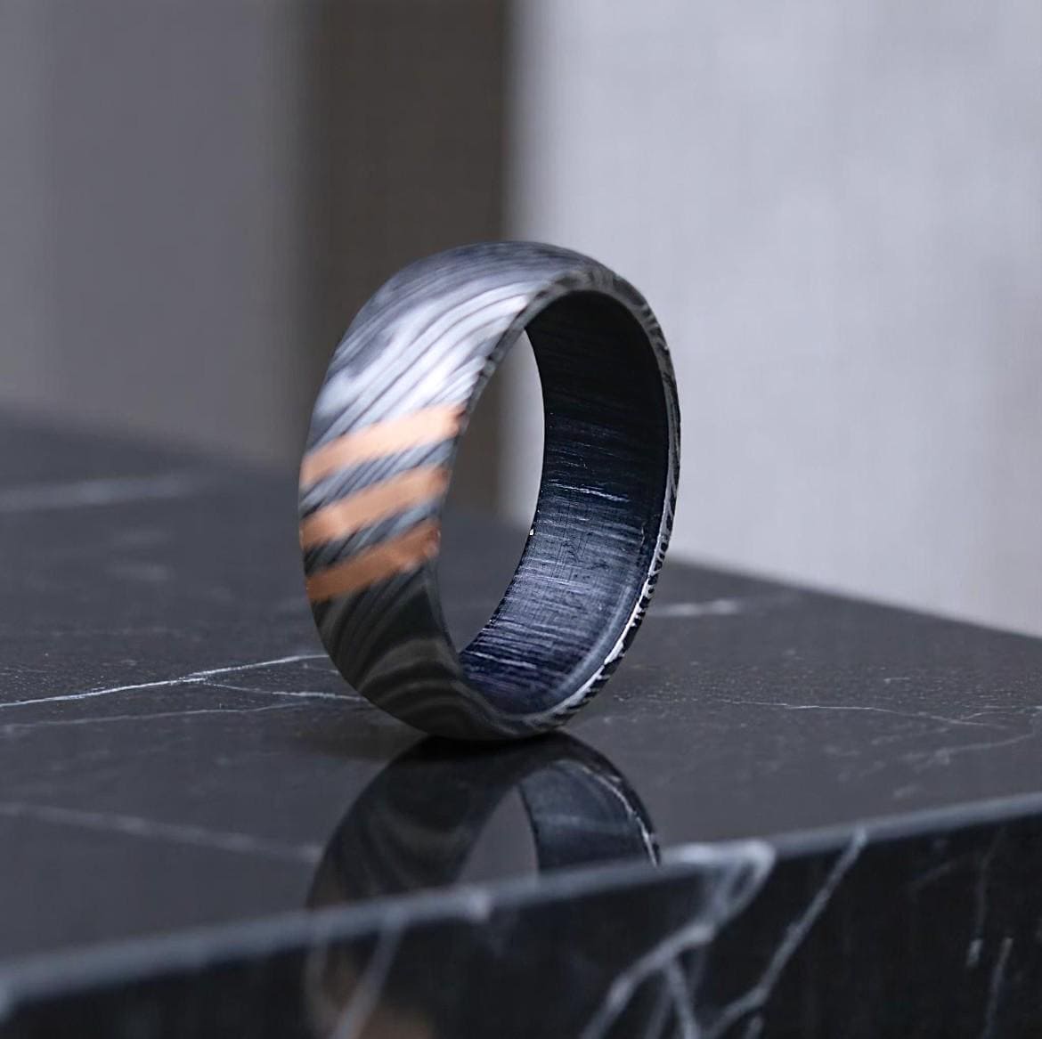 Damascus Steel Ring with Whiskey Barrel Wood Inlay