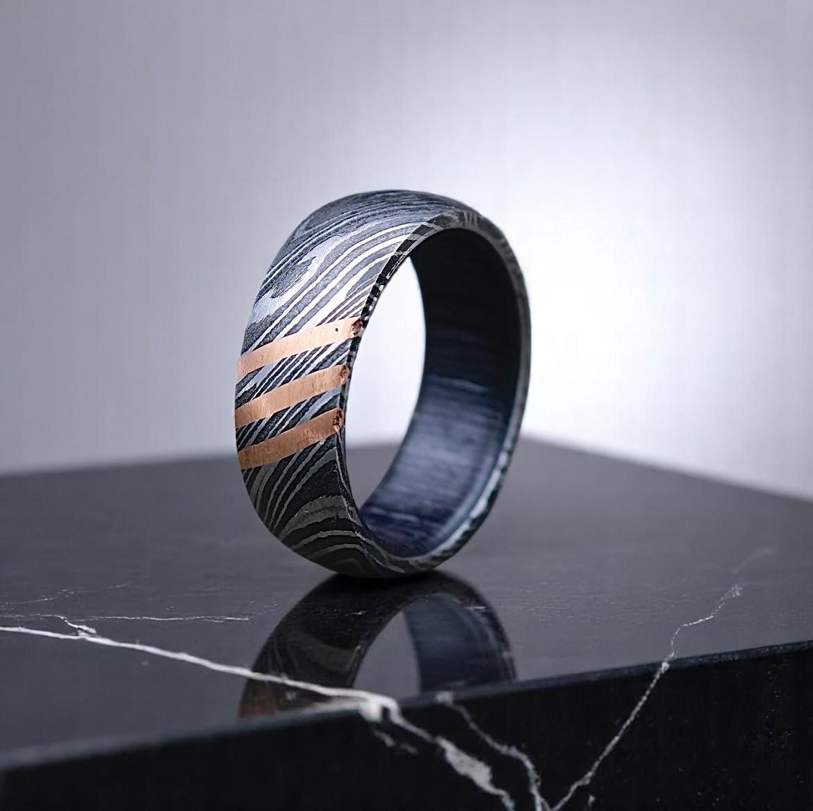 Damascus Steel Ring with Whiskey Barrel Wood Inlay