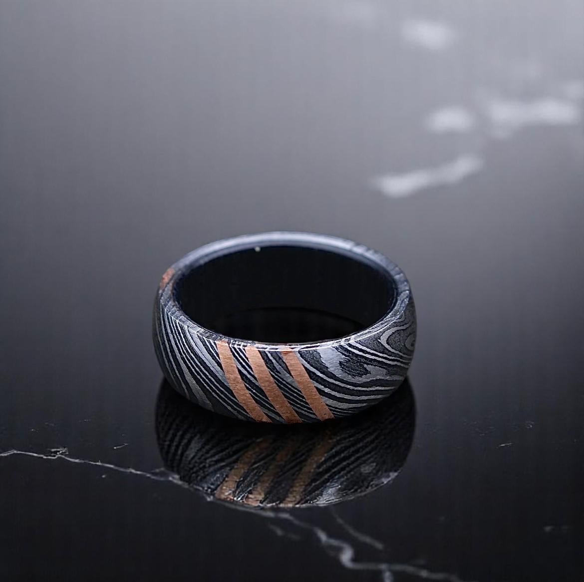 Damascus Steel Ring with Whiskey Barrel Wood Inlay